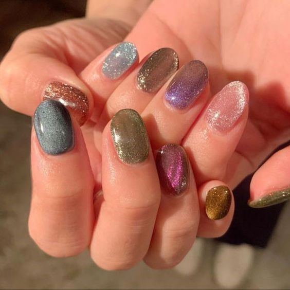 3. Play with Sparkle Effects Nail Art